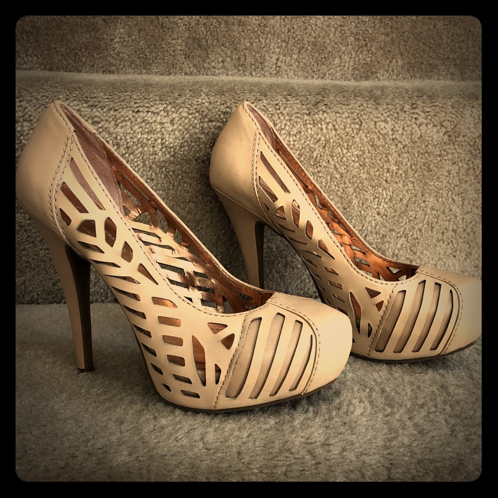 Nude cut out leather BCBGeneration platform heels.